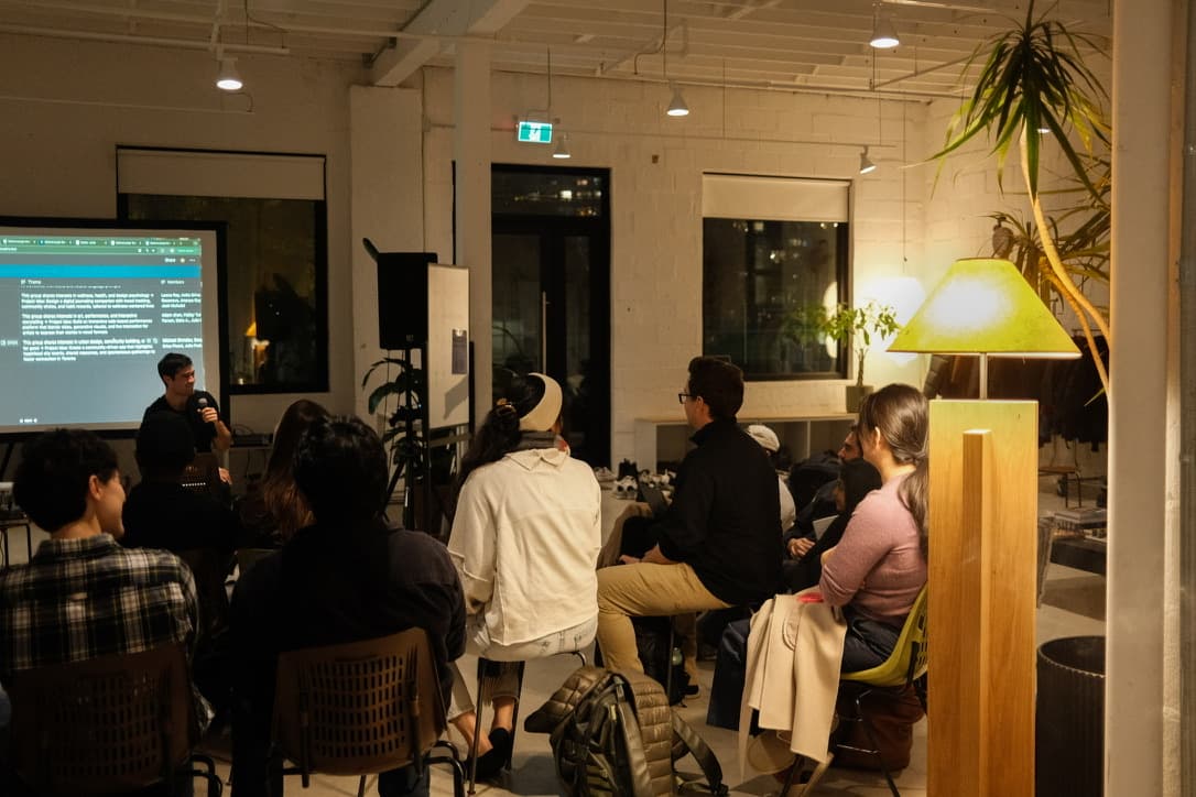 An audience watching a talk